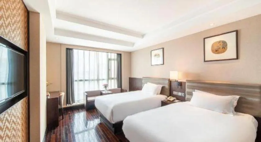 Bed in Yiwu Orange Boutique Hotel