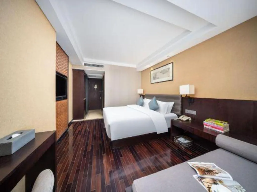 Bed in Yiwu Orange Boutique Hotel