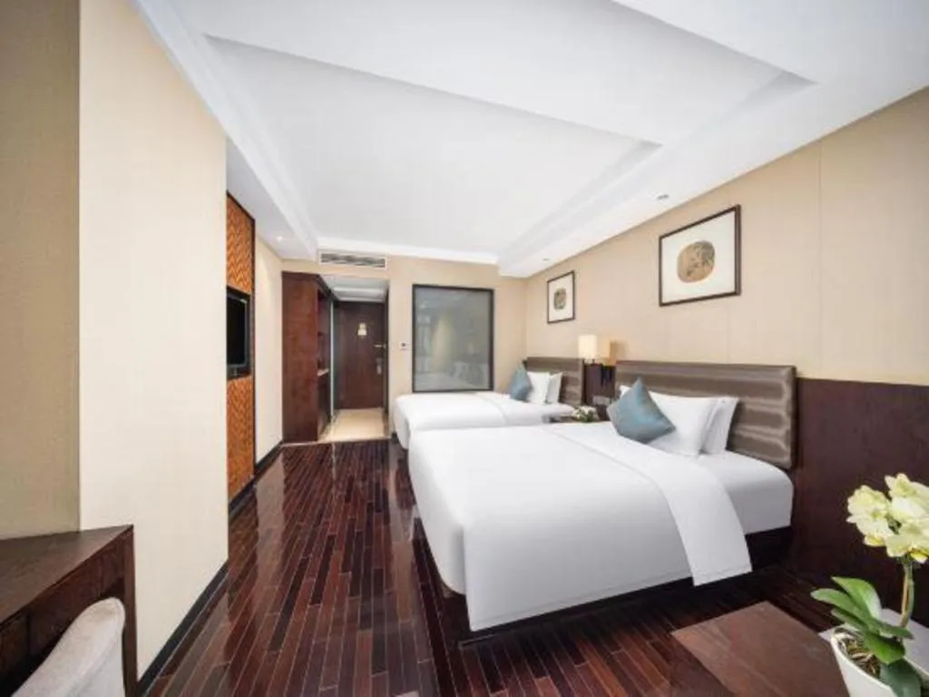 Bed in Yiwu Orange Boutique Hotel