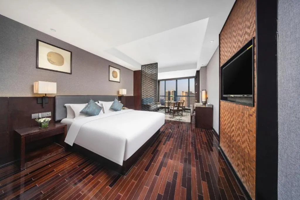 Bed in Yiwu Orange Boutique Hotel