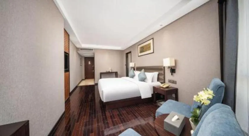 Bed in Yiwu Orange Boutique Hotel