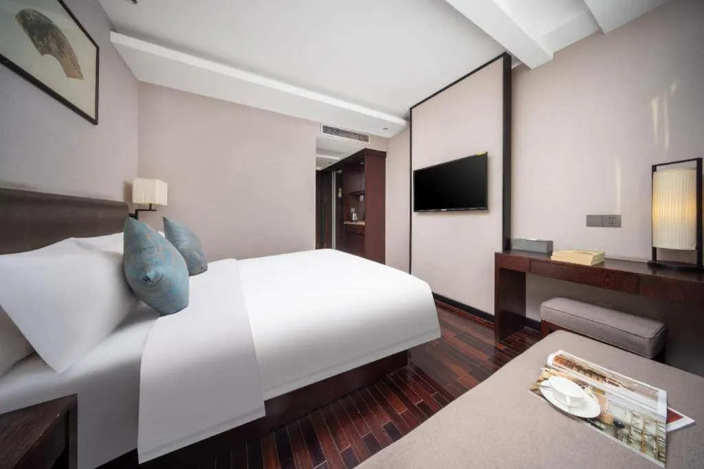 Bed in Yiwu Orange Boutique Hotel