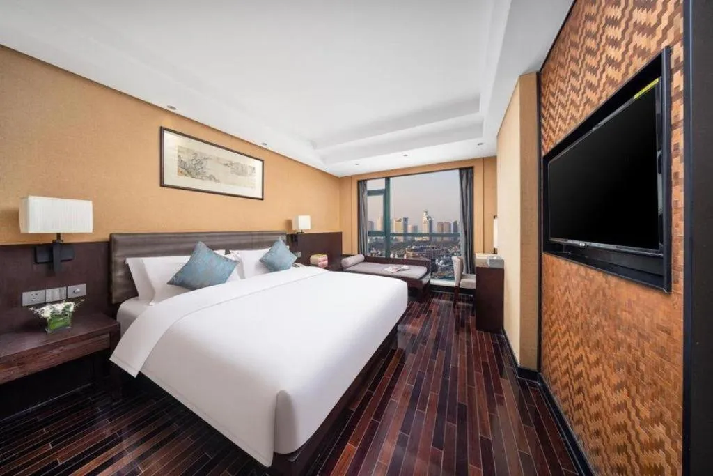 Bed in Yiwu Orange Boutique Hotel