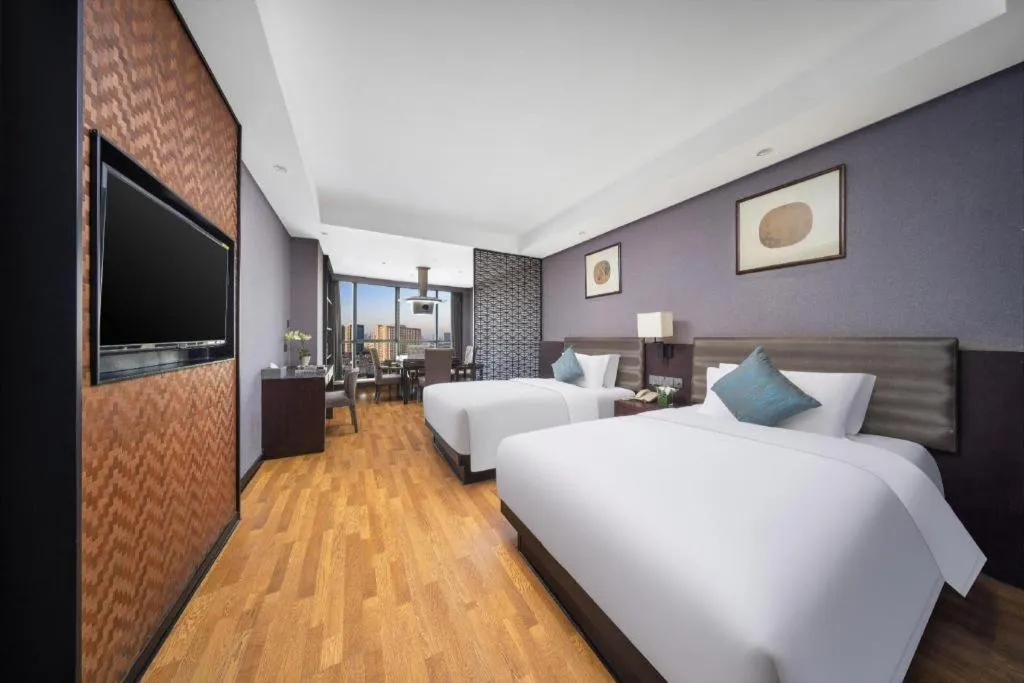 Bed in Yiwu Orange Boutique Hotel