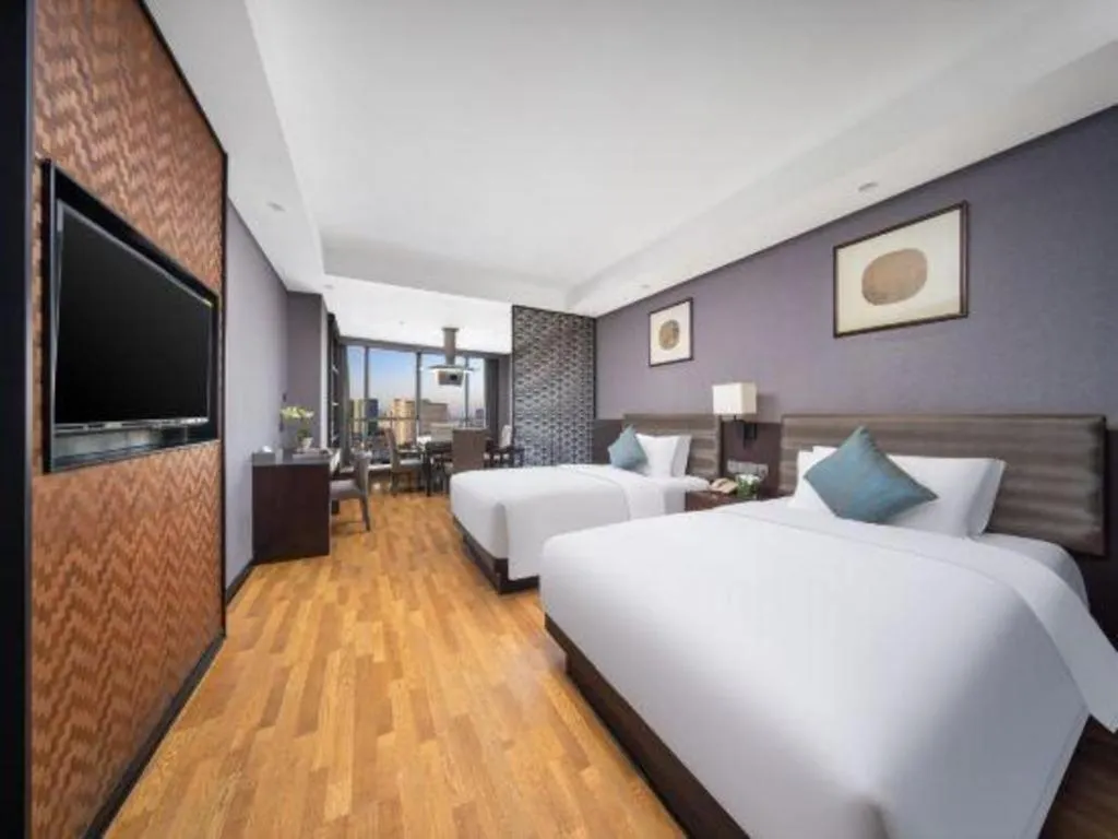 Bed in Yiwu Orange Boutique Hotel