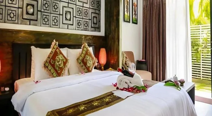 Bed in Ladear Angkor Boutique Hotel