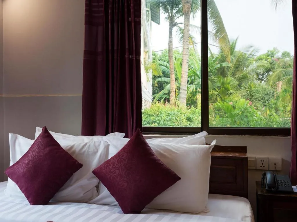 Bed in Ladear Angkor Boutique Hotel