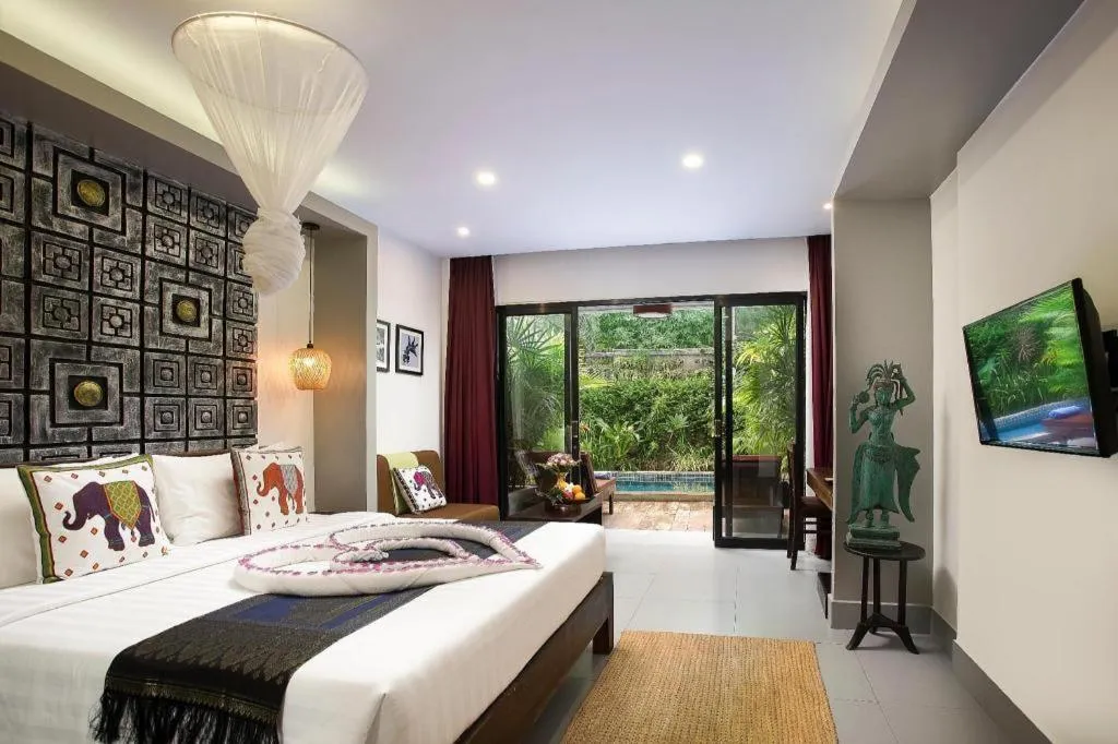 Bed in Ladear Angkor Boutique Hotel