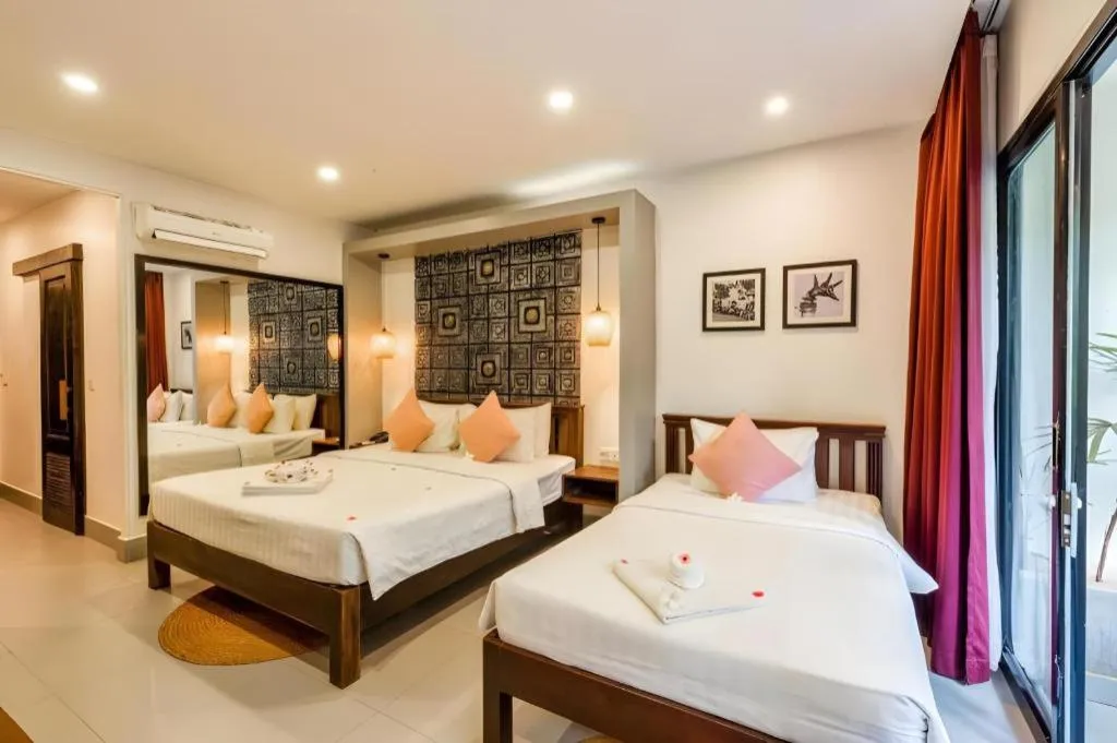 Bed in Ladear Angkor Boutique Hotel