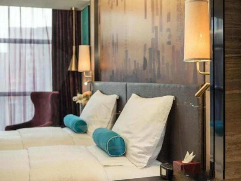 Bed in Shijiazhuang Ximeijin Continental Hotel