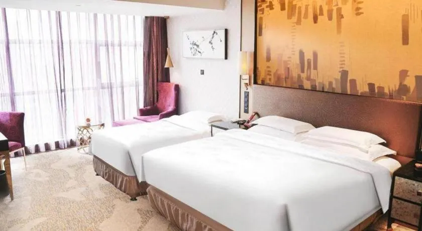 Bed in Shijiazhuang Ximeijin Continental Hotel