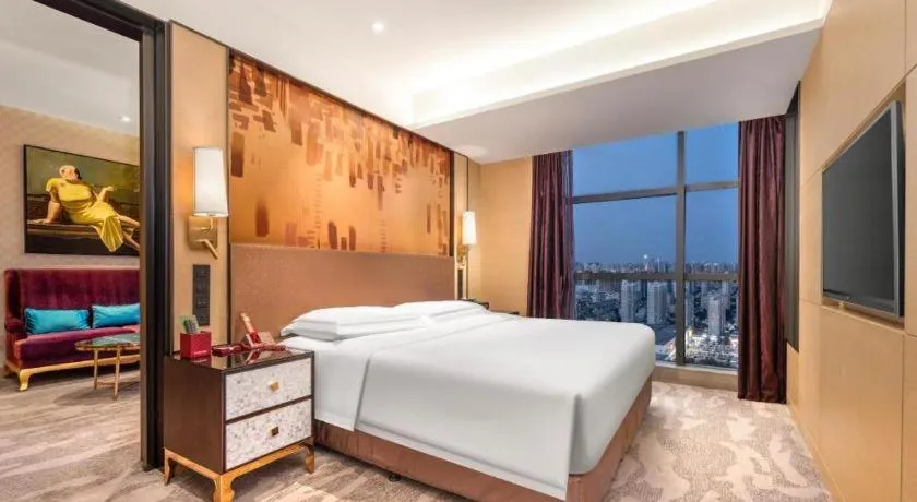 Bed in Shijiazhuang Ximeijin Continental Hotel