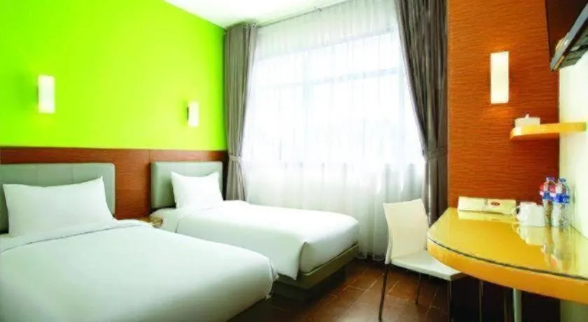 Bed in Amaris Hotel La Codefin Kemang
