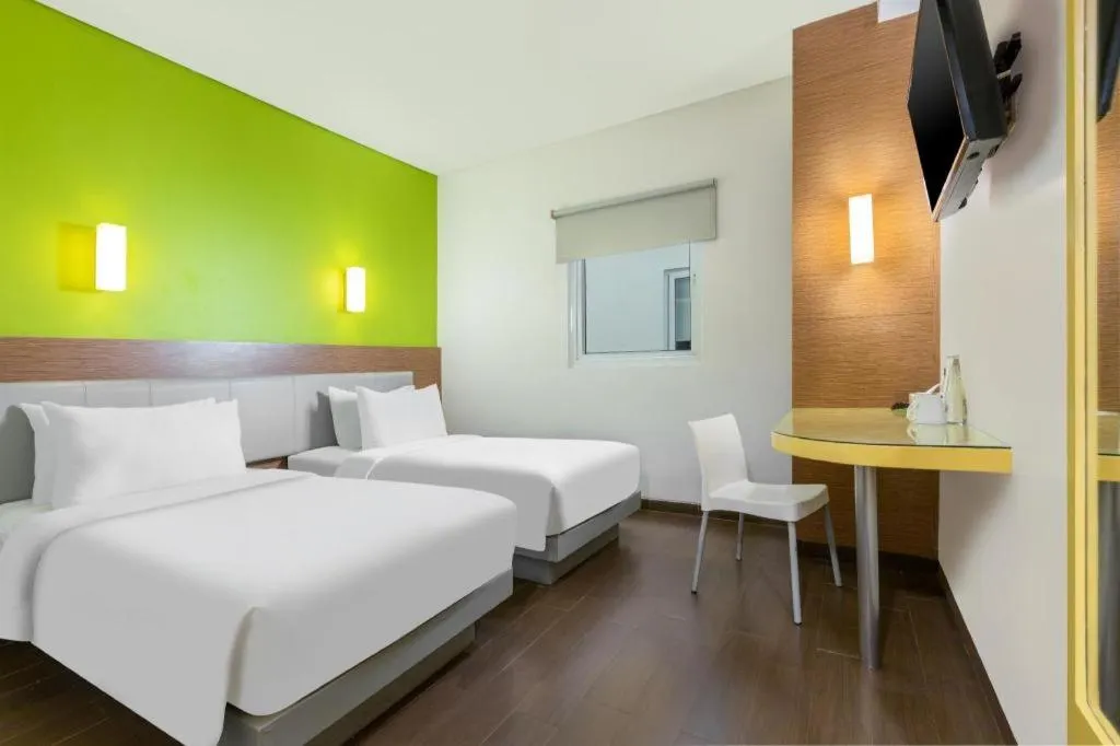 Bed in Amaris Hotel La Codefin Kemang