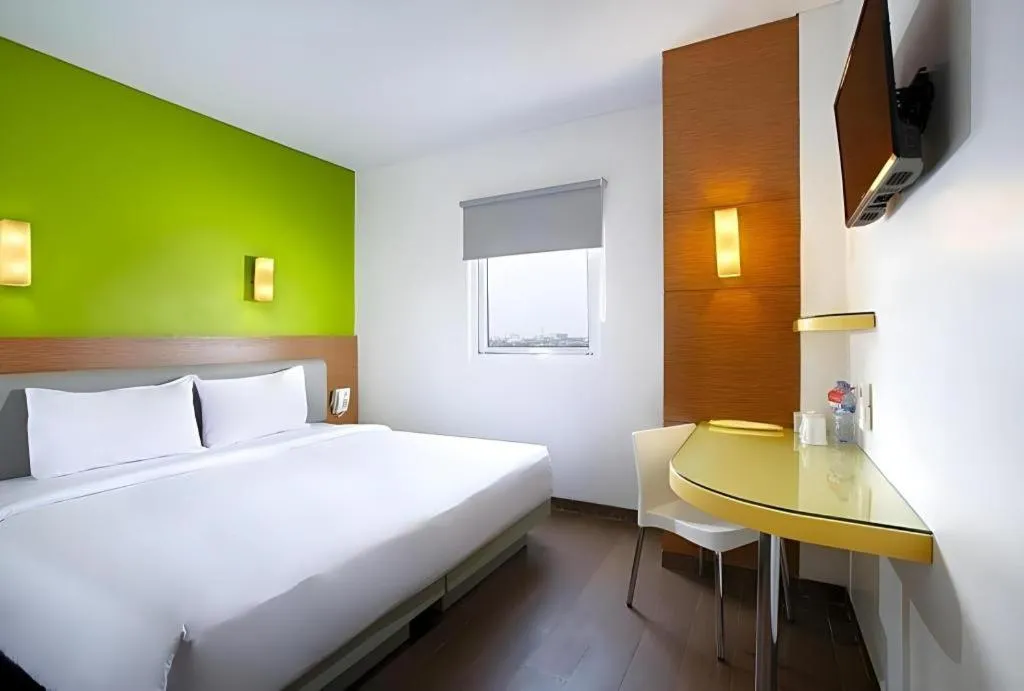 Bed in Amaris Hotel La Codefin Kemang