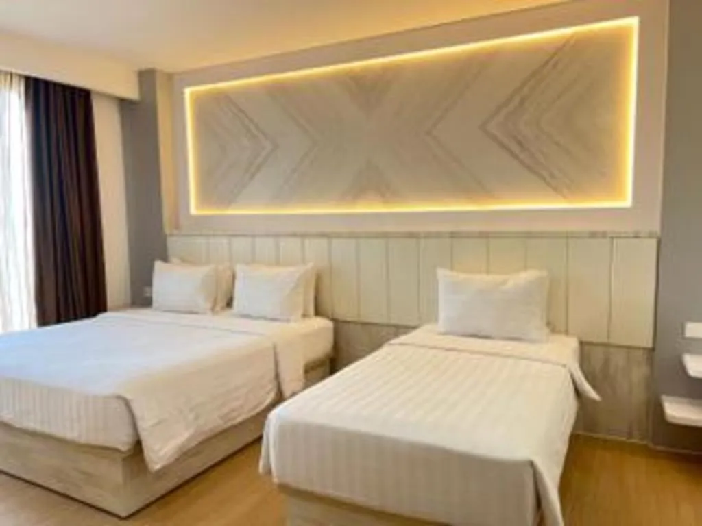 Bed in The Belagri Hotel and Convention