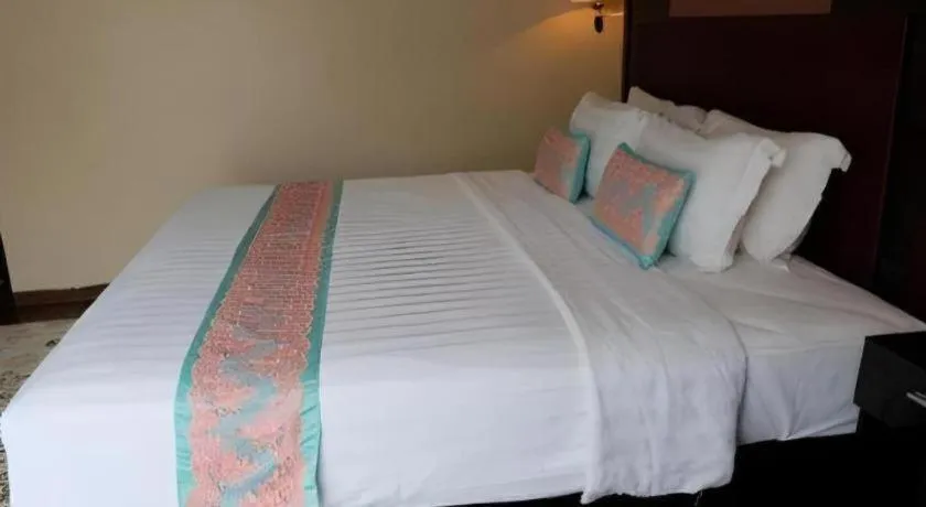 Bed in The Belagri Hotel and Convention