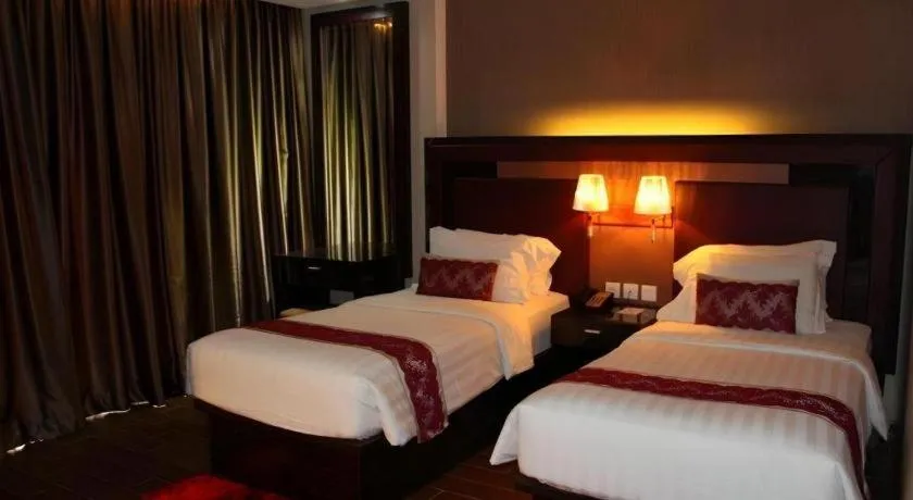 Bed in The Belagri Hotel and Convention