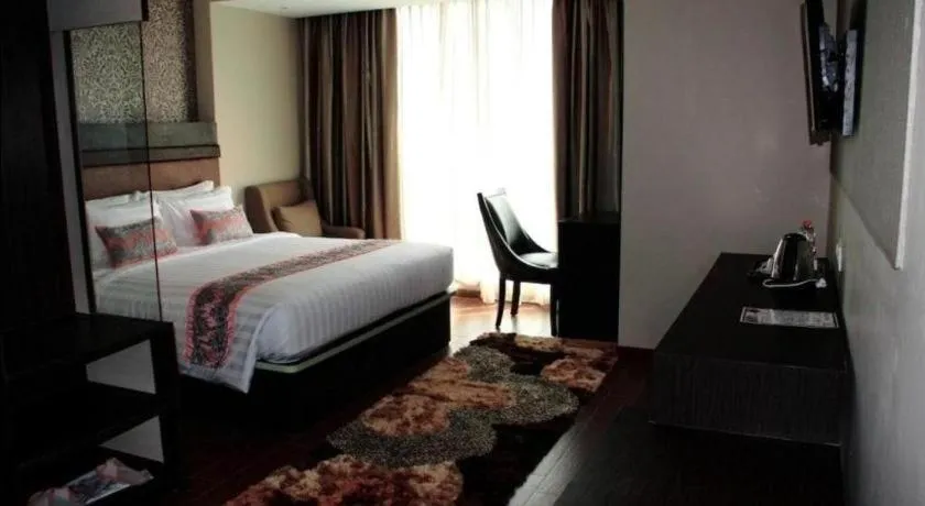 Bed in The Belagri Hotel and Convention