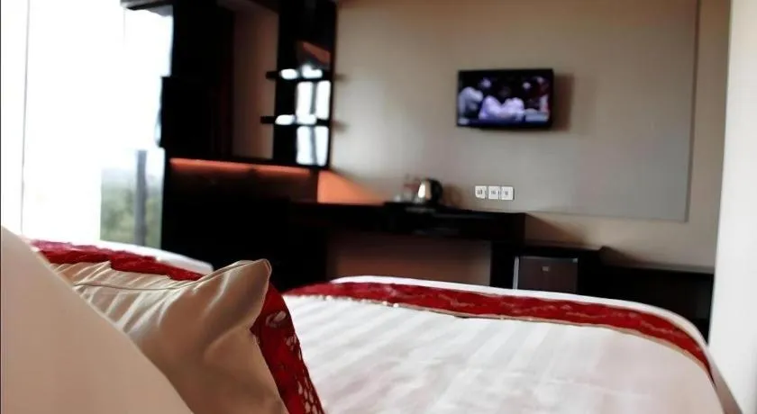 Bed in The Belagri Hotel and Convention