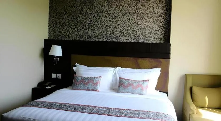 Bed in The Belagri Hotel and Convention