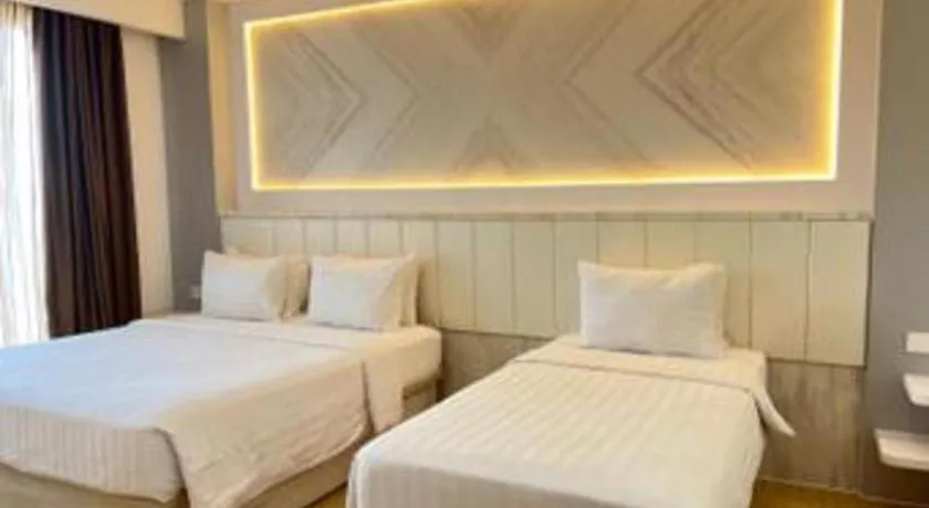 Bed in The Belagri Hotel and Convention