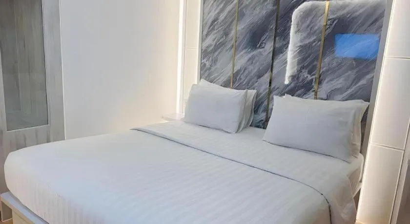 Bed in The Belagri Hotel and Convention