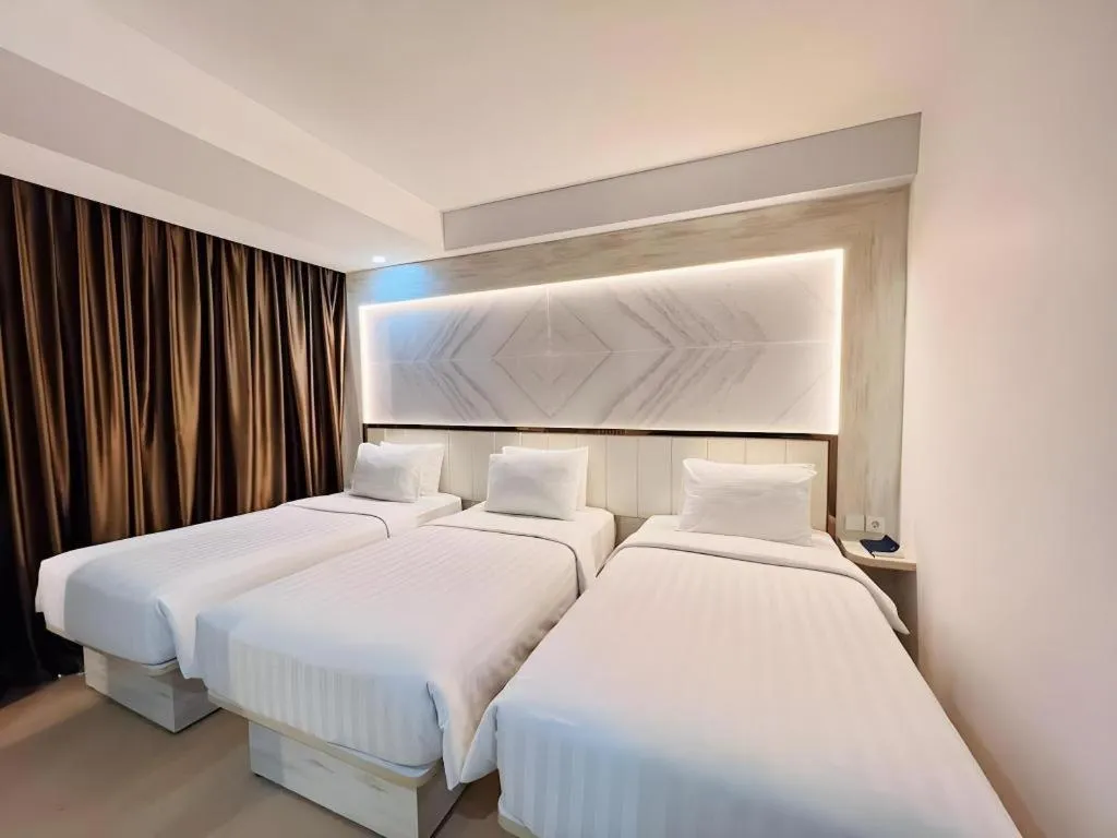 Bed in The Belagri Hotel and Convention