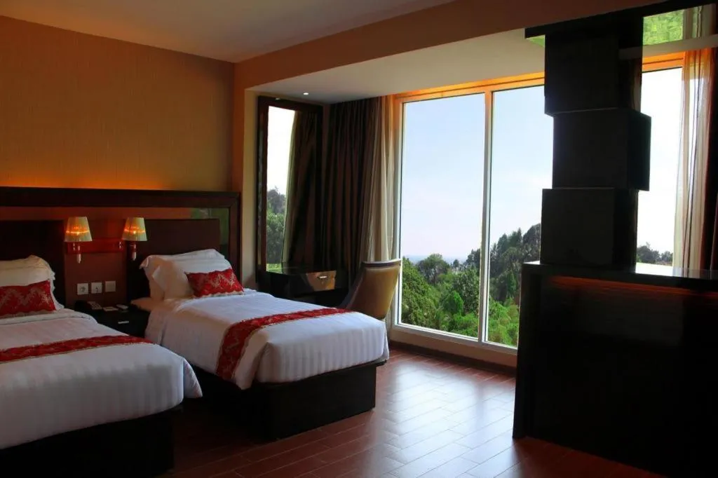 Bed in The Belagri Hotel and Convention