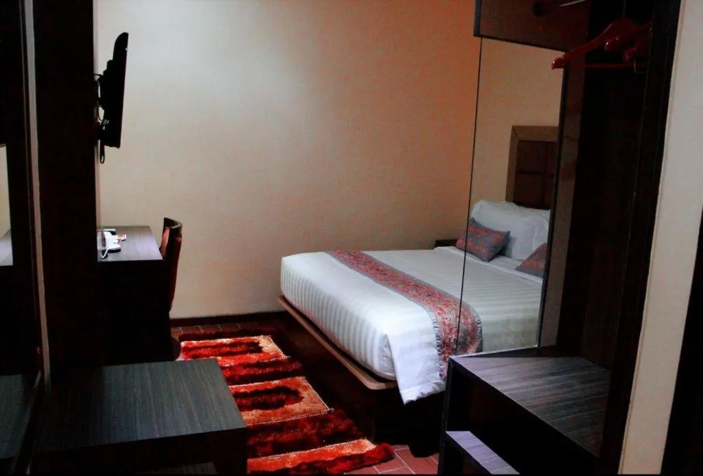 Bed in The Belagri Hotel and Convention