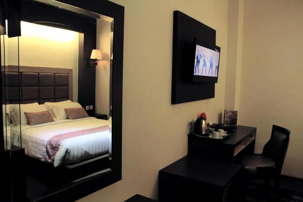 Bed in The Belagri Hotel and Convention