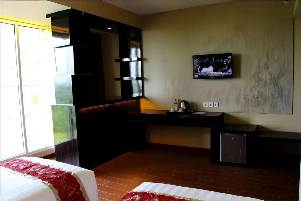 Bed in The Belagri Hotel and Convention