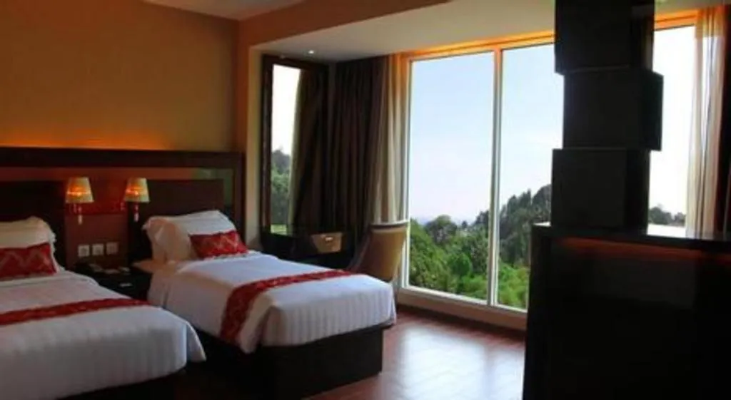 Bed in The Belagri Hotel and Convention