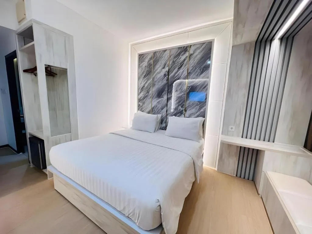 Bed in The Belagri Hotel and Convention