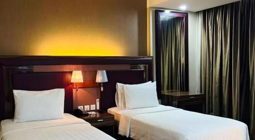 Bed in The Belagri Hotel and Convention