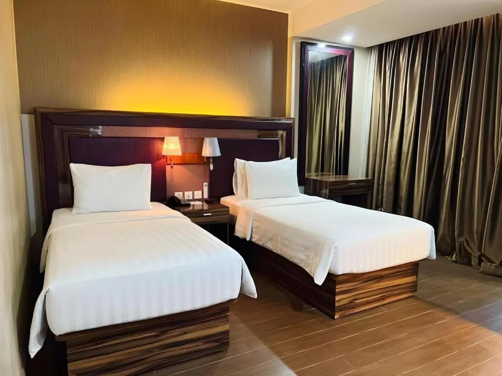 Bed in The Belagri Hotel and Convention