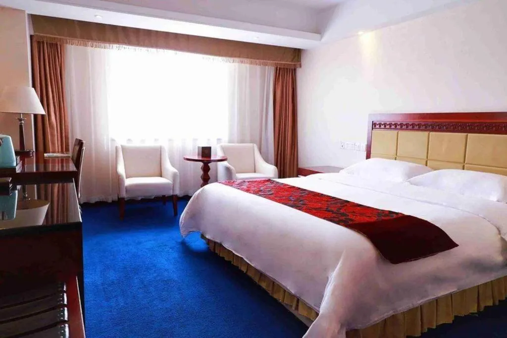 Bed in Dalian Southern Airline Pearl Hotel