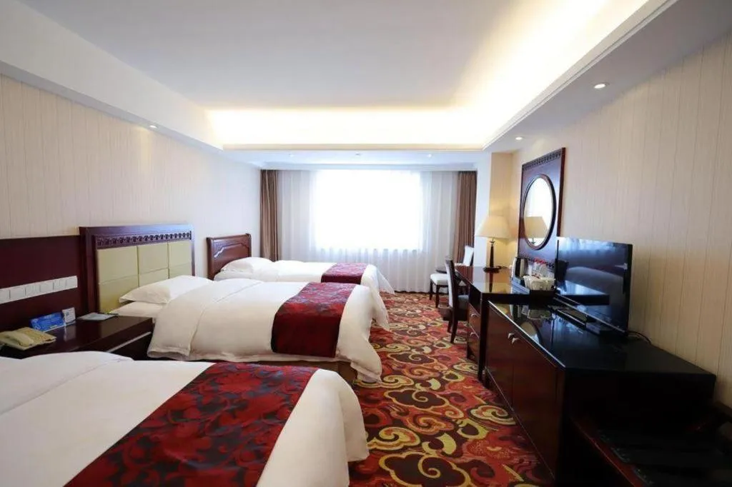 Bed in Dalian Southern Airline Pearl Hotel