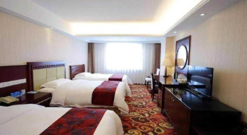 Bed in Dalian Southern Airline Pearl Hotel