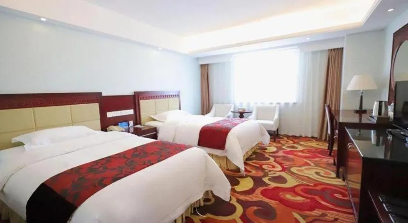 Bed in Dalian Southern Airline Pearl Hotel