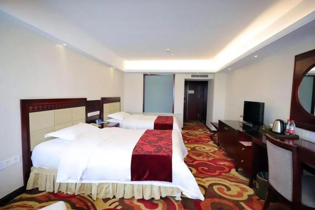 Bed in Dalian Southern Airline Pearl Hotel