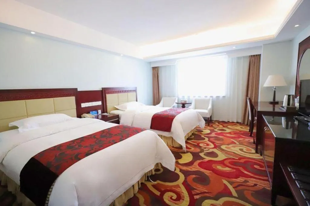 Bed in Dalian Southern Airline Pearl Hotel