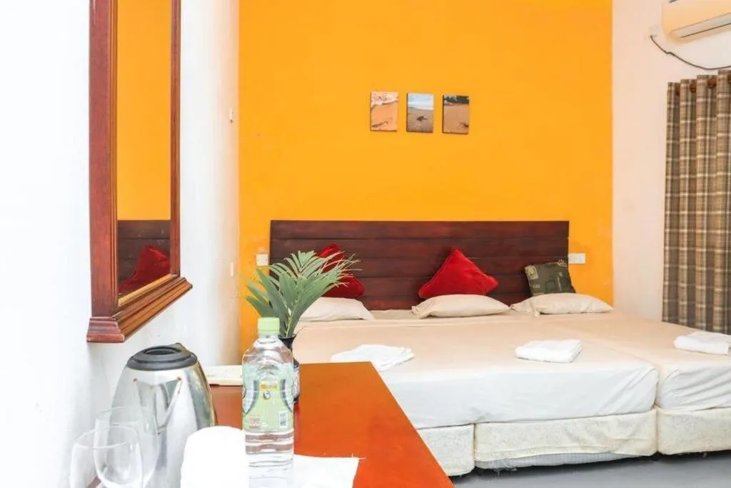 Bed in New Tristar Beach Hotel