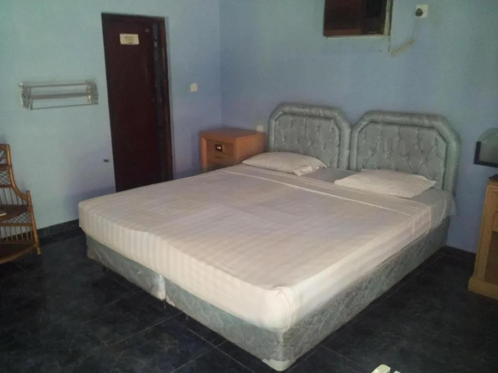 Bed in New Tristar Beach Hotel