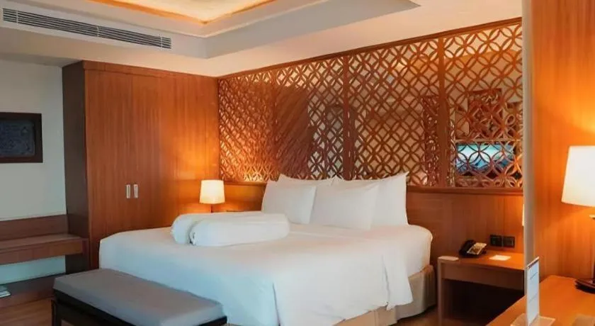 Bed in Indoluxe Hotel Jogjakarta