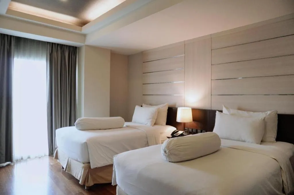 Bed in Indoluxe Hotel Jogjakarta