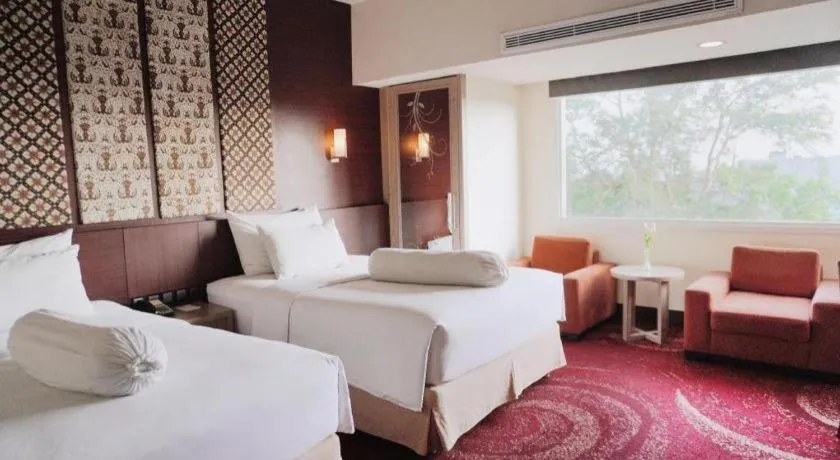 Bed in Indoluxe Hotel Jogjakarta