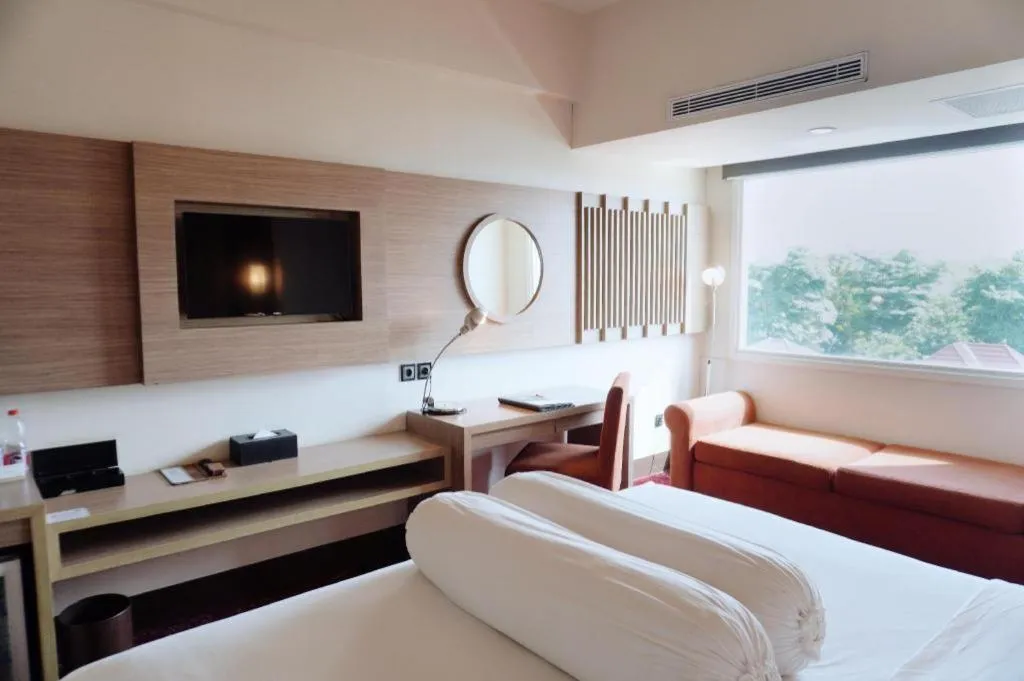 Bed in Indoluxe Hotel Jogjakarta