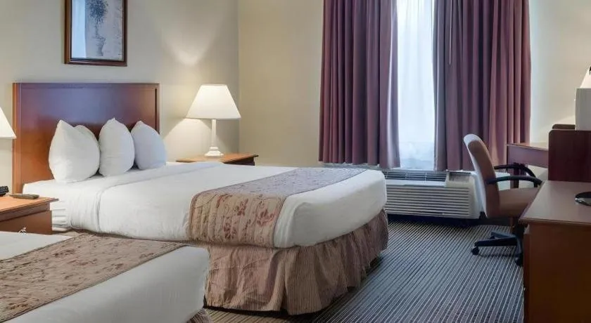 Bed in Rodeway Inn Greenville