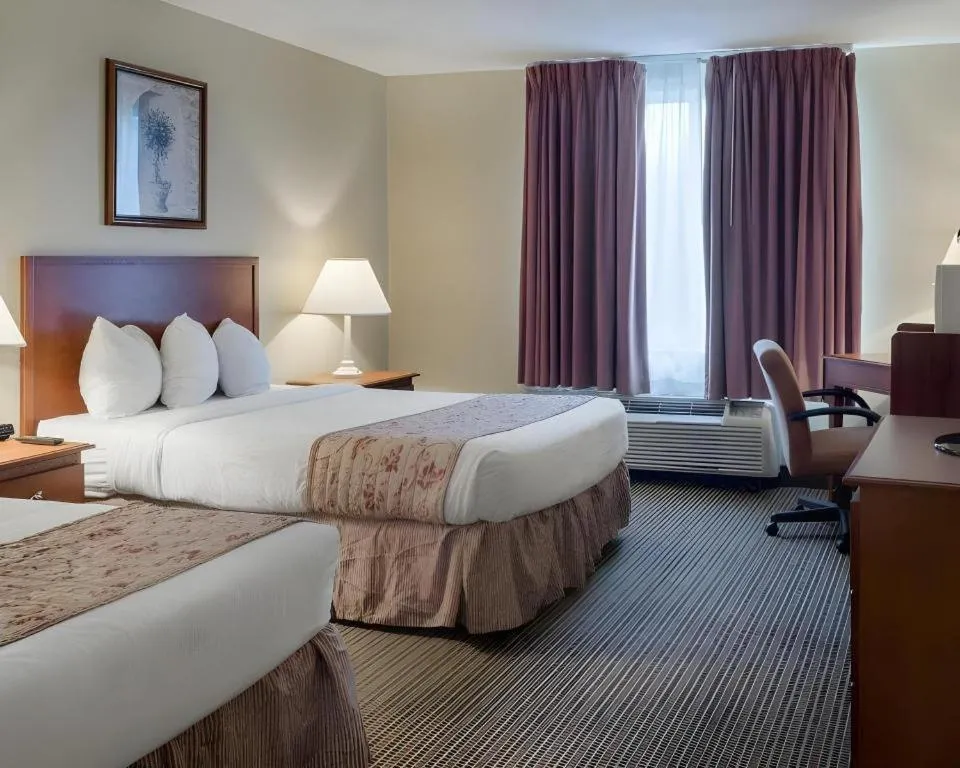 Bed in Rodeway Inn Greenville